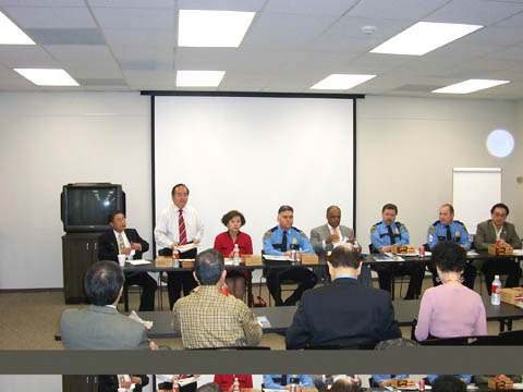 Kenneth Li speaks to the media at the monthly Asian American Business Council meeting.