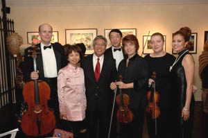 Houston City Councilman Gordon Quan, the orchestra, and Ms. Busch